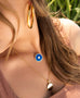 gold plated delicate chain with round enamel evil eye pendant