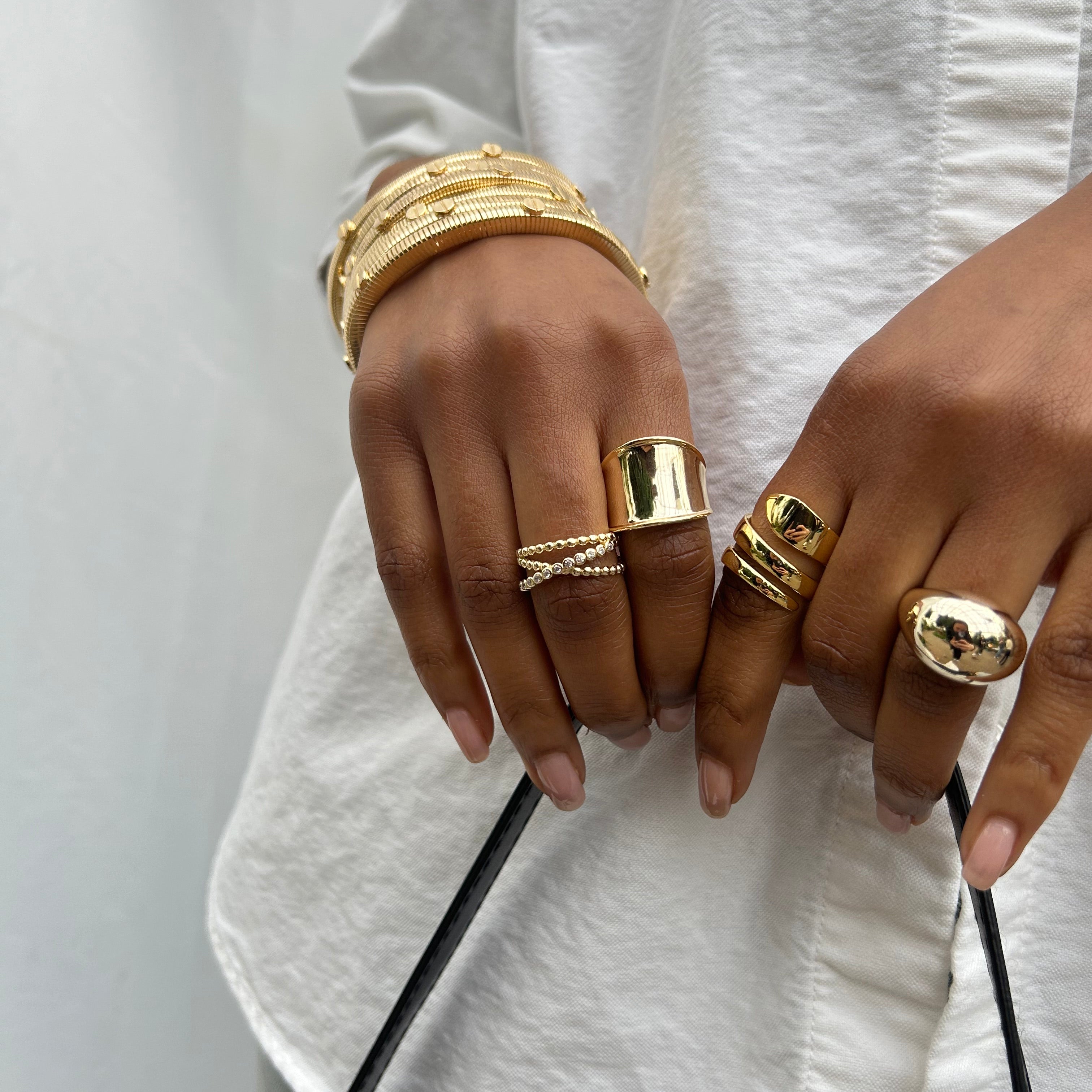CZ and Plain Ball Crossover Ring