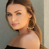 large open hoop earring with disc beads