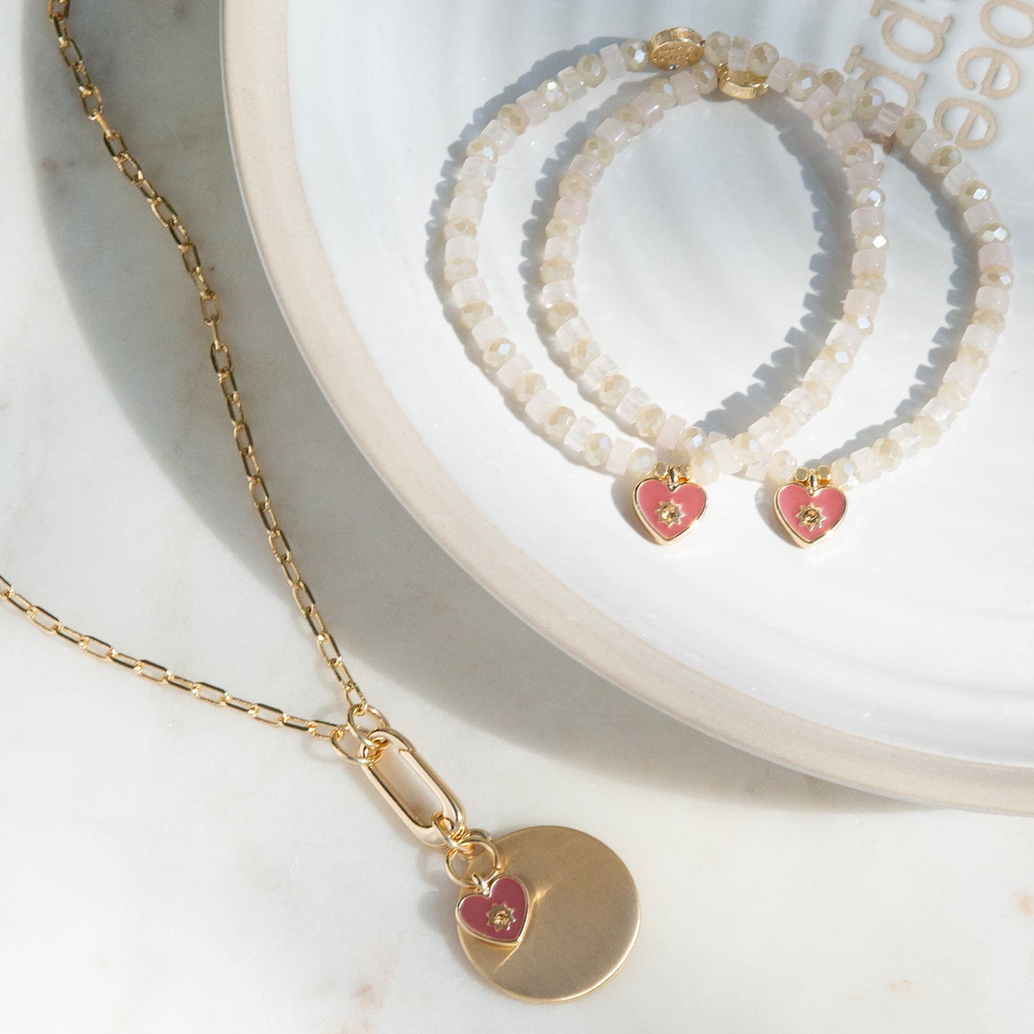 pink enamel heart disc pendant necklace