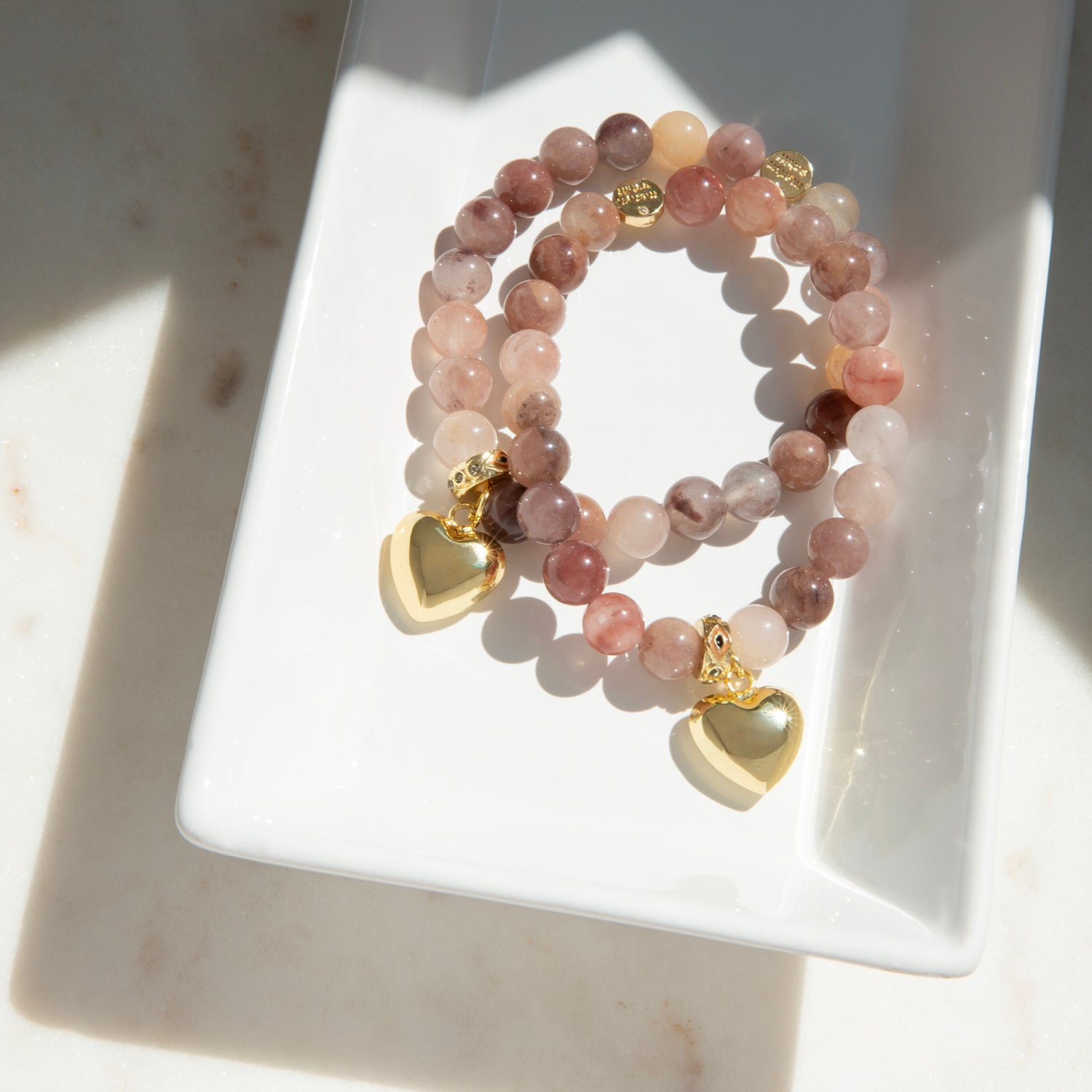 natural stone bracelet with puffed heart charm and pave rondelle