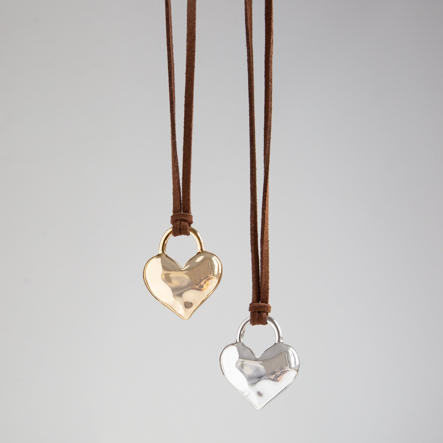 suede necklace with puffy heart