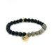 teal beaded bracelet with disc charm