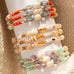 crystal beaded stretch wrap accented in pearl beads