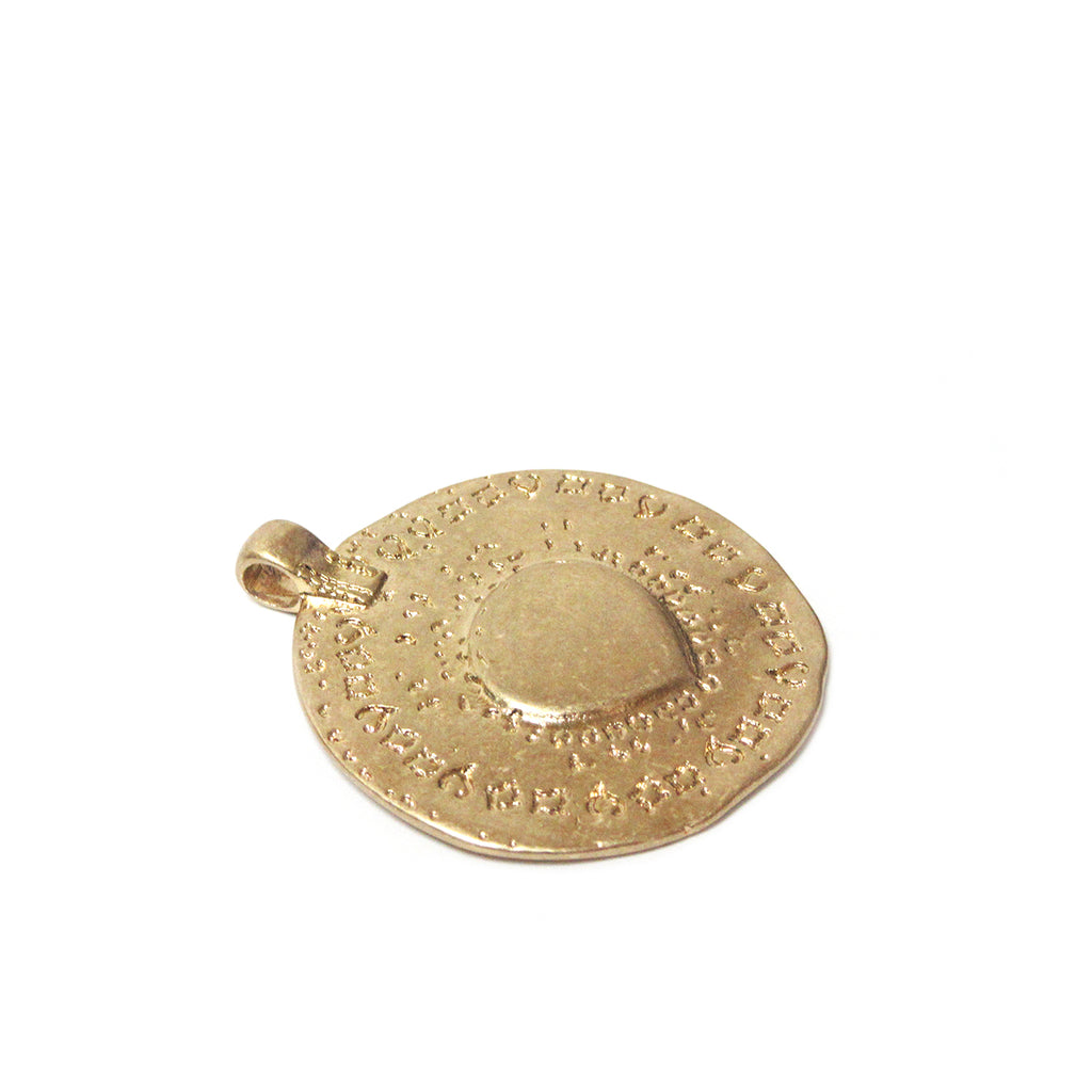 hammered disc bale charm